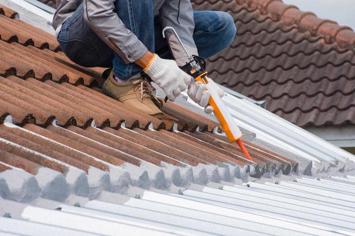 Roof tile repair in progress